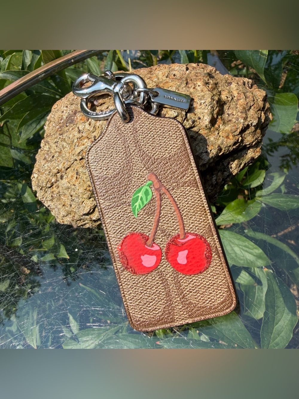 EUC COACH SIGNATURE CHERRY BAG CHARM (F26853)